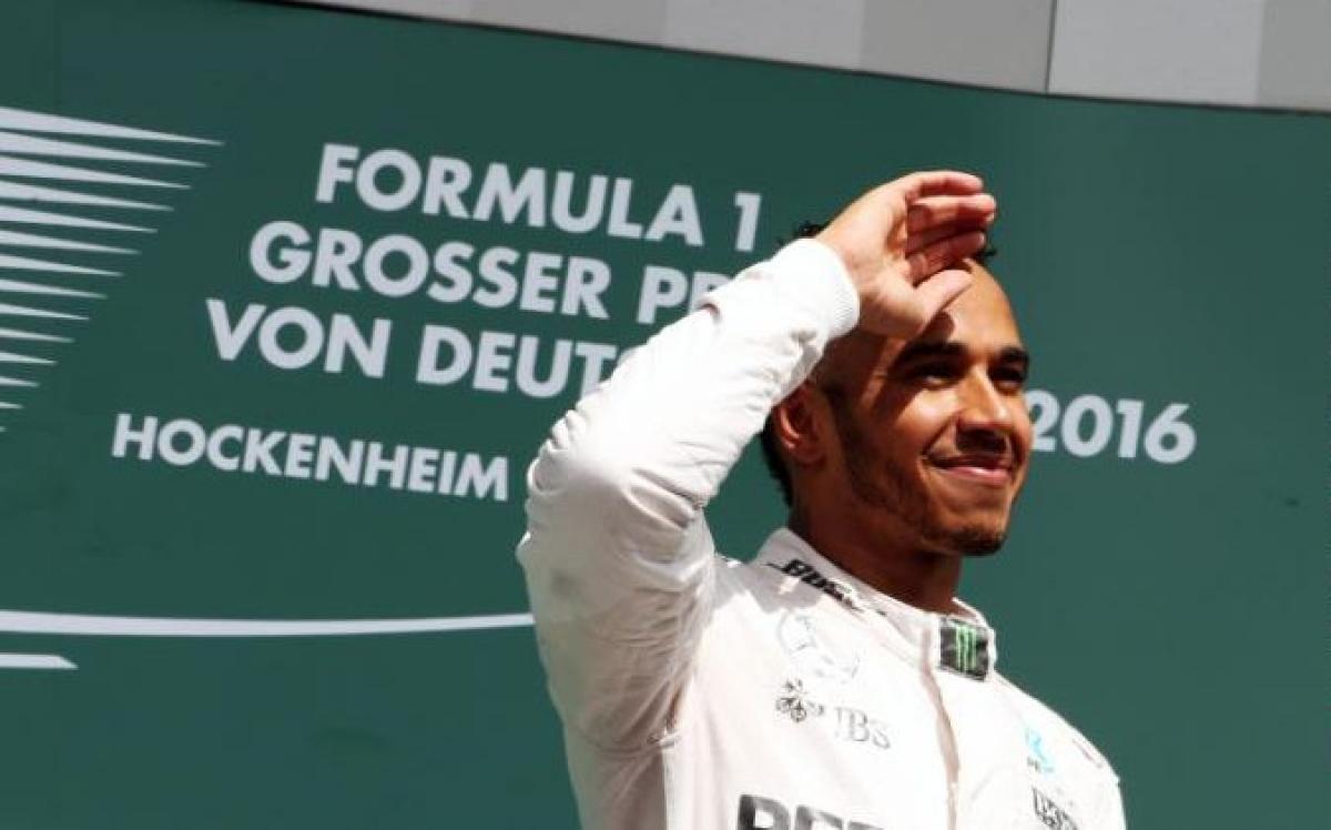 F1 champ Hamilton on summer holiday after lead over Rosberg